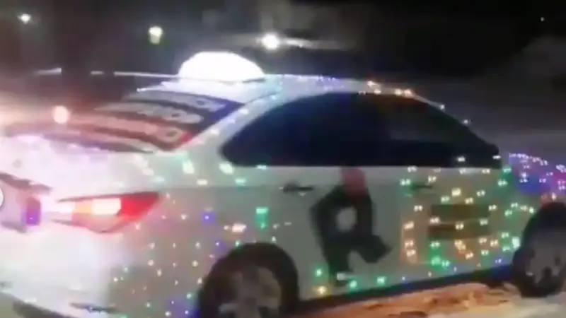 Көлікті безендірген такси жүргізушісі жазаланды