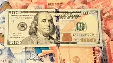 Теңгенің орташа бағамы Т0,3-ке түсіп, Т419,02/$1 болды