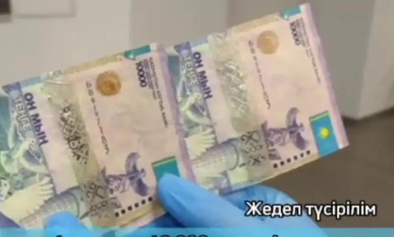 Алматыда 10 000 теңгелік жалған банкноттарды сатумен айналысқандар ұсталды