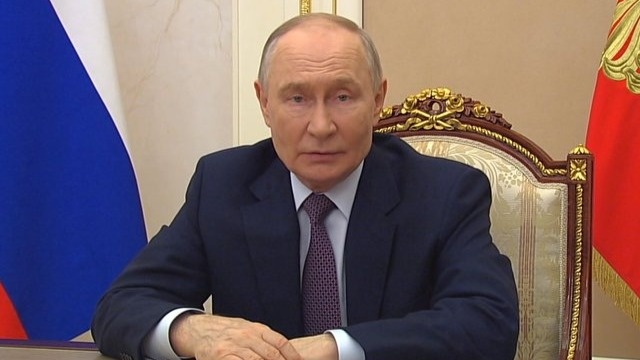Путин
